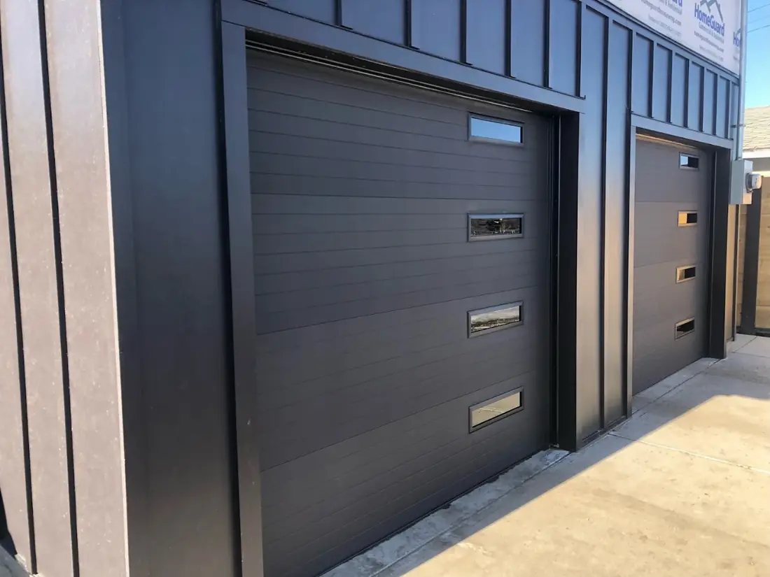 Black board and batten, a garage built by Alliance Renovations
